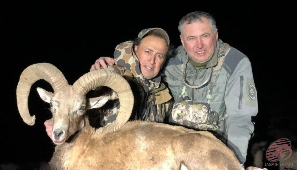 Night wild sheep hunting in Iran with hunters posing beside a trophy, hunt in Iran wildlife experience.